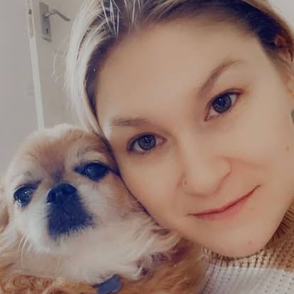 Sarah with a beloved pet companion
